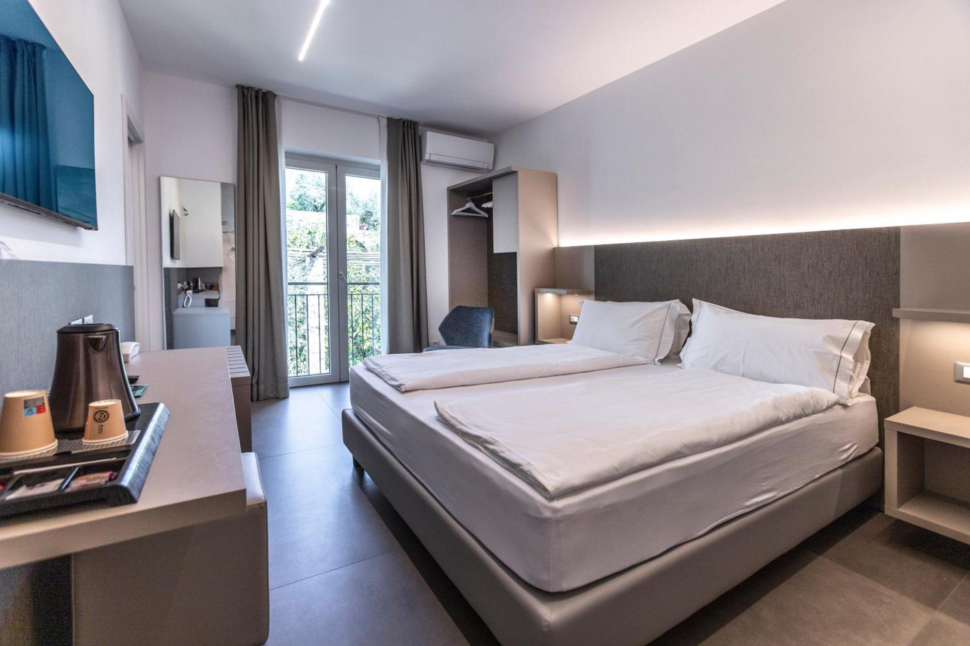 Hotel Livia Гарньяно Номер фото