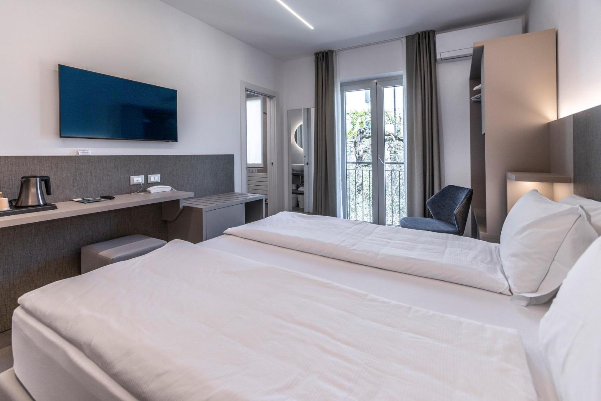Hotel Livia Гарньяно Номер фото
